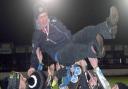 HOPE: Comets team manager Tony Jackson was held aloft after their first ever league title win		Picture: Dave Payne