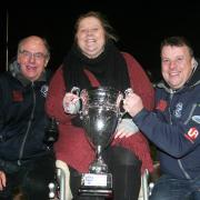 Champions: Workington Comets won the Knockout Cup last night as team manager Tony Jackson, owner Laura Morgan and co-promoter Steve Whitehead celebrate (Photo: David Payne)