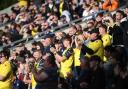 Oxford United fans pay respect to Jack Badger with a minute’s applause against Burnley last month