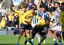 Dane Scarlett scored a stoppage time leveller for Oxford United