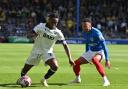 Kyle Edwards takes on Josh Murphy at Portsmouth