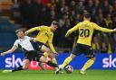 Tyler Goodrham and Ruben Rodrigues look to get possession