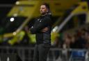 Oxford United head coach Des Buckingham on the touchline against Derby County