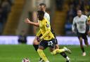 Siriki Dembele on the ball against Derby County