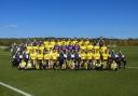 Oxford United players with pupils from Pegasus Primary School for the football club’s squad photo