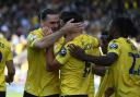 Ciaron Brown congratulates Idris El Mizouni after his goal against Stoke City