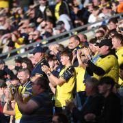 Oxford United fans pay respect to Jack Badger with a minute’s applause against Burnley last month