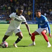 Kyle Edwards takes on Josh Murphy at Portsmouth