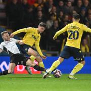 Tyler Goodrham and Ruben Rodrigues look to get possession