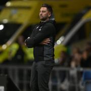 Oxford United head coach Des Buckingham on the touchline against Derby County