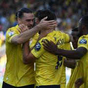 Ciaron Brown congratulates Idris El Mizouni after his goal against Stoke City