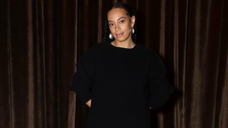 Solange Knowles at Milan Fashion Week, wearing a Black dress.